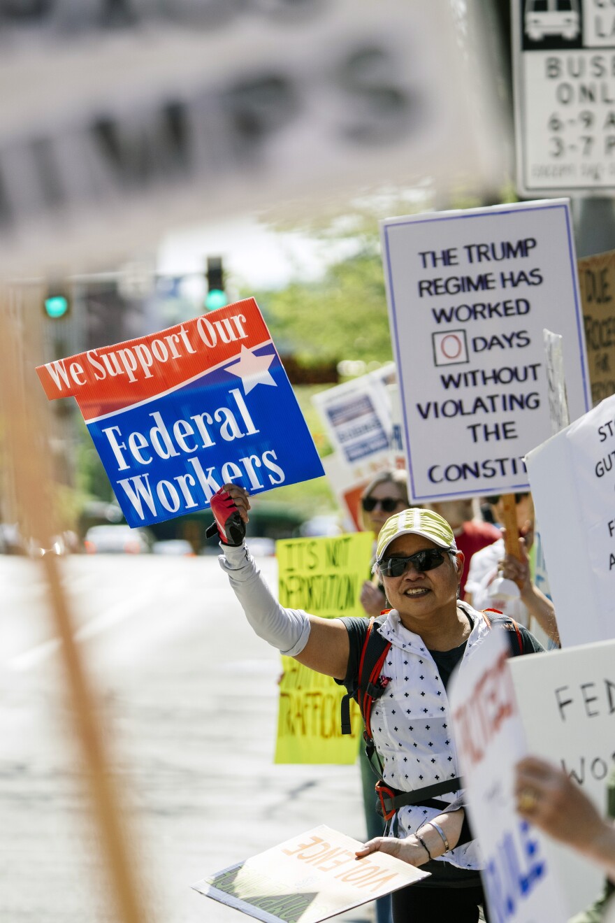 Retired FBI agent Becky Chan joined the rally to support federal workers in downtown Seattle for this time in April. "It's very important to me...even though I've been retired for a long time, I'm connected to federal workers."