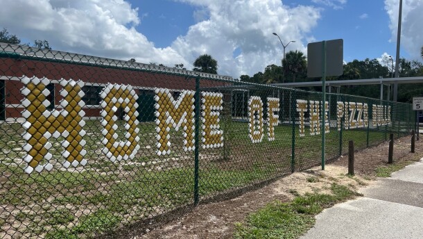Home of the pizzo bulls marked on fence