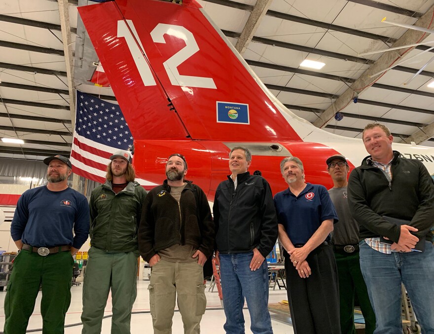 (L-R) Shawn Faiella, Tyson Lucier, Isaac Karuzas, Steve Daines, Casey Judd, Fred Thompson, Shane Ralston during a roundtable at Neptune Aviation in Missoula, Mont., May 17, 2019.