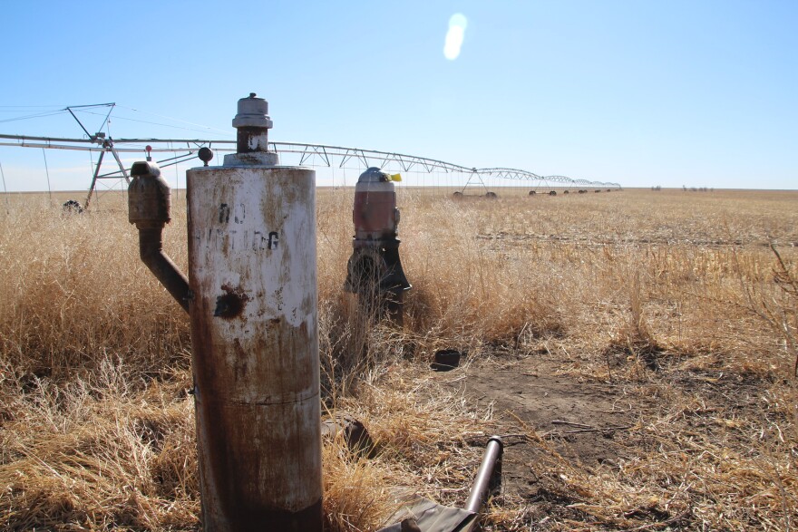 An old water well in a field