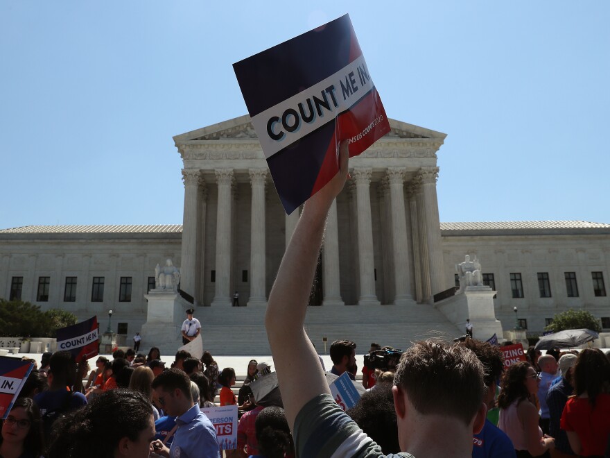 Demonstrators against the now-blocked census citizenship question gather in front of the U.S. Supreme Court in June 2019 in Washington, D.C. A federal judge in New York ruled Thursday to penalize the Trump administration for failing to disclose documents before going to trial over the question.