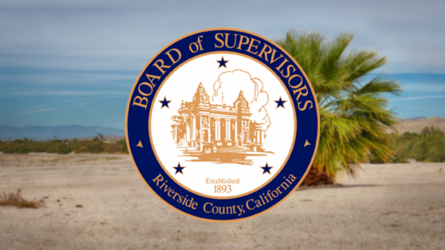 Seal of Riverside County Board of Supervisors over a picture of the Salton Sea.