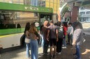 A group of DPS freshmen from Ponitz Technical Career Center practice boarding an RTA bus at the downtown Hub. This exercise was part of DPS's Freshman Orientation.