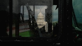 The U.S. Capitol is seen through a food truck window on April 14, 2022, in Washington