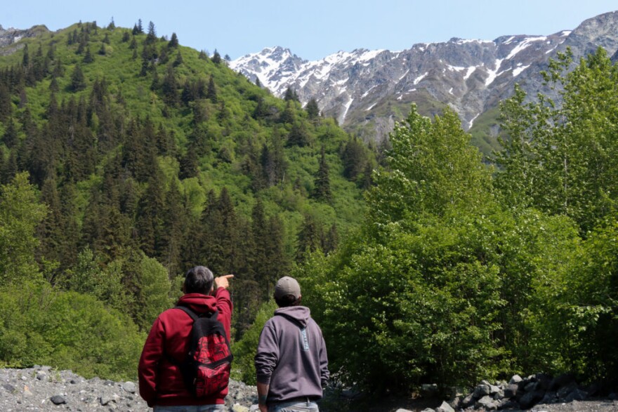 Chilkat Indian Village environmental staff stand on the 23 mile slide area during a site visit in 2025.