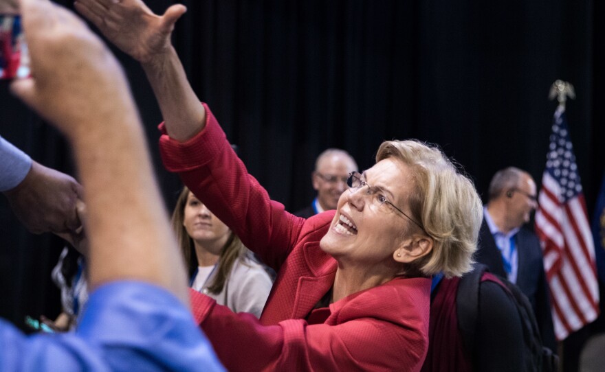 Democratic presidential candidate Sen. Elizabeth Warren shakes hands with supporters after speaking at the New Hampshire Democratic Party Convention in Manchester, N.H., last week.