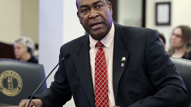 Sen. Donald Douglas, a Republican from Nicholasville, presents his bill allowing health care providers to deny services that don't follow their conscience in a Kentucky Senate committee.