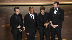 Photo of Sam A. Davis accepting his Academy Award