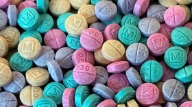 Close-up of small brightly colored pills