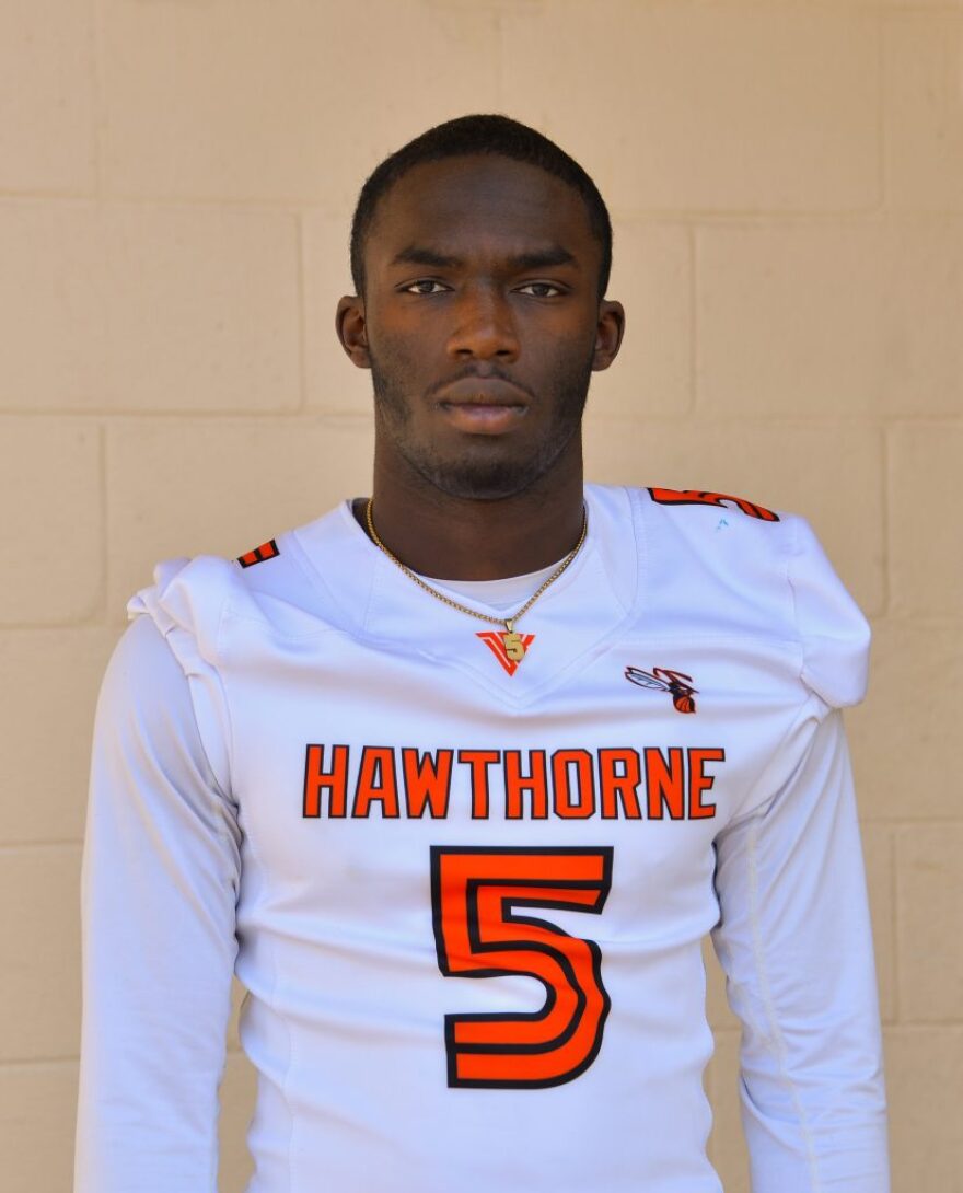 The ground of their practice field is too hard for tackling. The Hawthorne  Hornets won the state football championship anyway