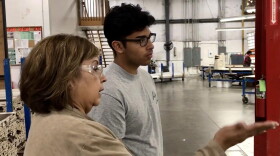 Chris Camacho, a youth apprentice in a similar program in Elkhart County, learns about the operations of the factory on his first day.