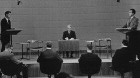 Presidential candidates Sen. John Kennedy, left, and Vice President Richard Nixon face each other in a Chicago television studio during the first-ever televised presidential debate on Sept. 26, 1960. In center is moderator Howard K. Smith. (AP)