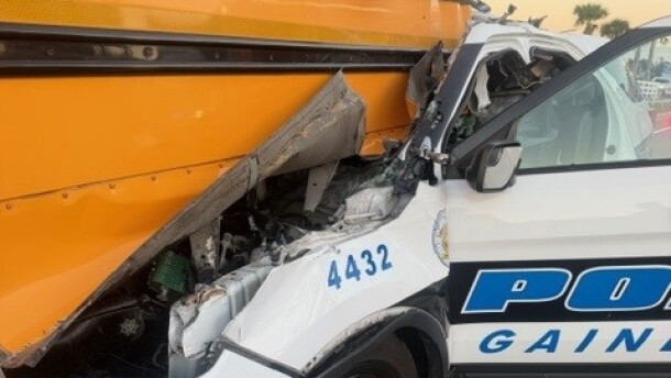 An off-duty Gainesville Police officer hit a school bus in Marion County Friday morning. Four were hurt in the accident.