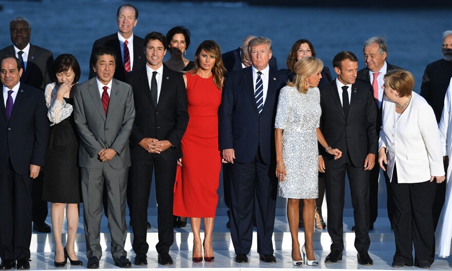 World leaders gather for a group photo at the G-7 summit in Biarritz, France, on Sunday. Summit host and French President Emmanuel Macron and President Trump held a joint news conference on Monday.