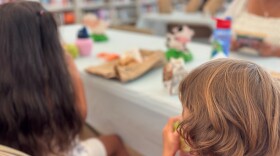 Kids at Ray D. Prueter Library tuck into their free lunch