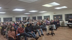 Roughly 100 people attended the Waldport City Council meeting on Dec. 10, 2025, to express their opposition any type of ICE facility in the city. The crowd spilled out into an adjacent hallway.