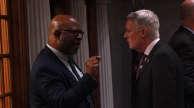 Senators Greg Taylor (D-Indianapolis) and Greg Good (R-Terre Haute) speak on the Senate floor after lawmakers vote on a bill removing CDLs for some immigrant truck drivers, Monday Feb. 23, 2026.