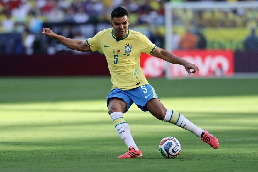 FILE - Brazil's Casemiro (5) kicks the ball in the first half during the World Cup Group C soccer match between Brazil and Morocco in East Rutherford, N.J., near New York, Saturday, June 13, 2026.