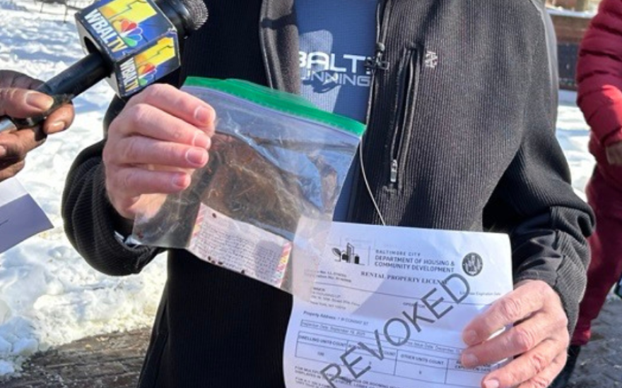 City councilmembers, tenants and housing advocates quickly stepped back when Lyba announced he was carrying bedbugs.