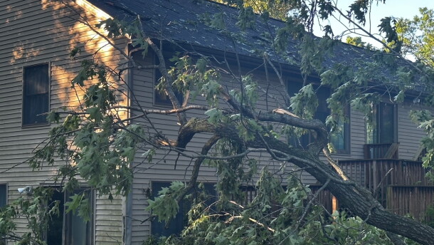 Powerful winds Thursday night knocked trees onto streets, power lines and homes across Michiana Thursday night, like this home in the Dunlap area in Elkhart County.