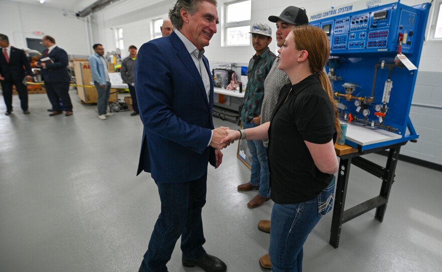 U.S. Secretary of the Interior Doug Burgum talks with Lackawanna College students Carly Powers, William Parry and Henry Lopez during a tour of the college.