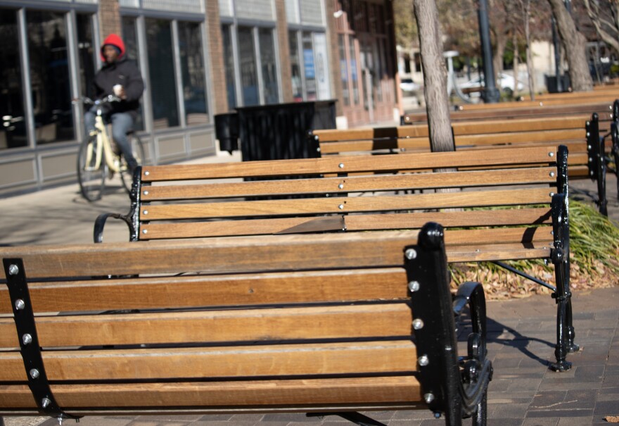 Benches along the west side of Main Street in Evansville.