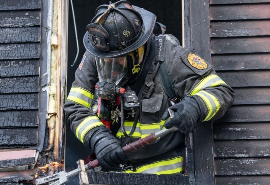 Concord and Hopkinton crews combat a house fire in May, 2026. (Concord Monitor photo)
