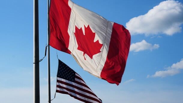 The national flags of Canada, front, and the United States fly outside the Galleria Mall in Buffalo, New York, Wednesday, Aug. 26, 2026.
