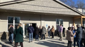 Community members gather outside the new Homeward Bound shelter for individuals experiencing homelessness in Wayne County on Feb. 10, 2025.