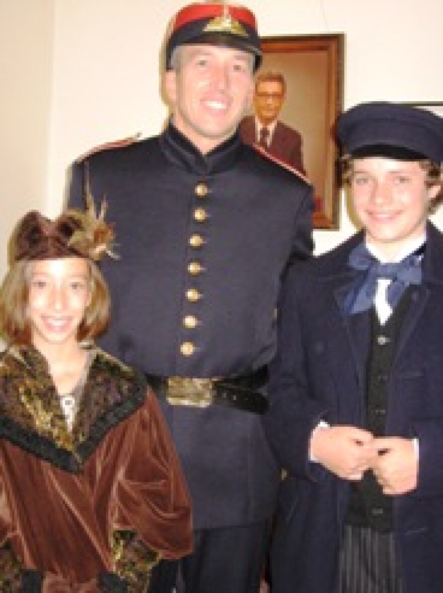 Family members in La boh?me (left to right): Brianna Drew, daughter, (in the Children's Chorus); Major John Drew, father, (Supernumerary); Corey Maisch, son, (Supernumerary)