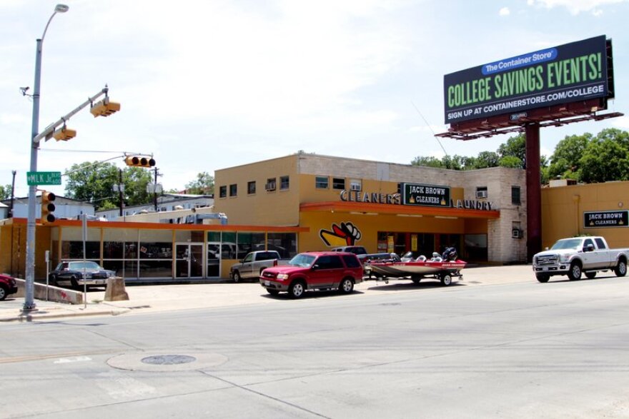 A group of yellow and orange colored buildings on MLK JR Boulevard