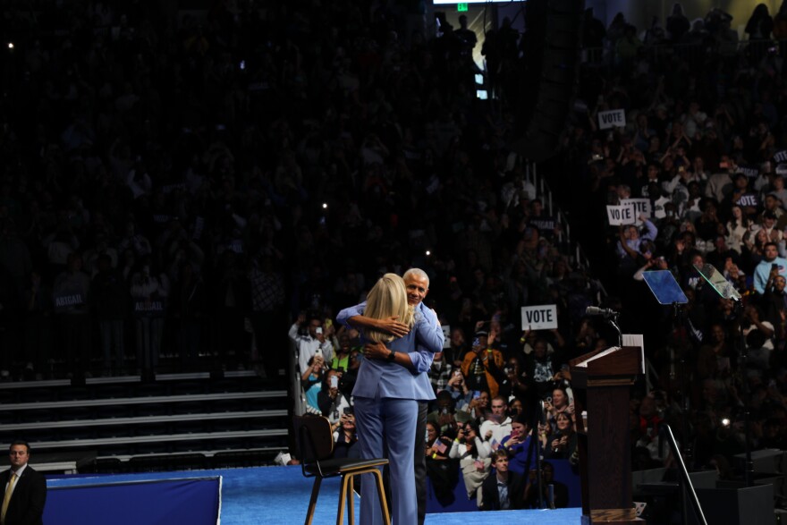 Congresswoman Abigail Spanberger and President Barack Obama embrace before Obama addresses the crowd at Chartway Arena Nov. 1.