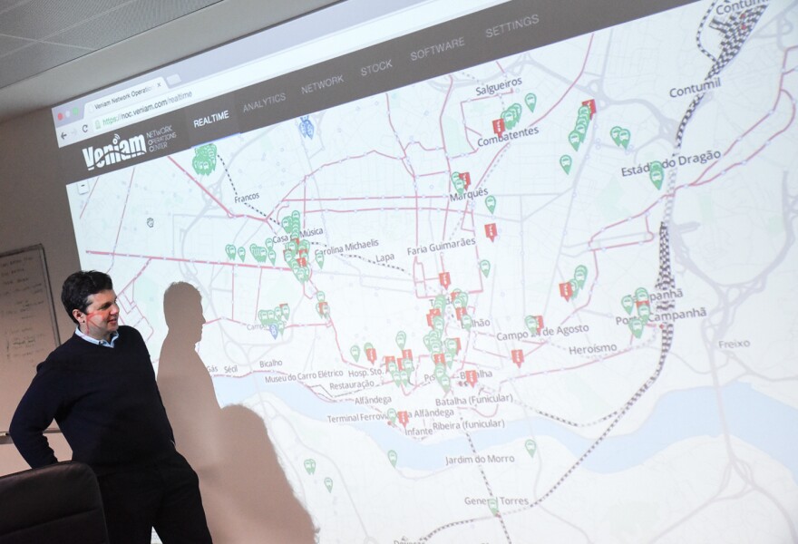 Inside Veniam's Porto office, CEO Joao Barros displays a map tracking Wi-Fi routers on buses and sensors planted around the city.