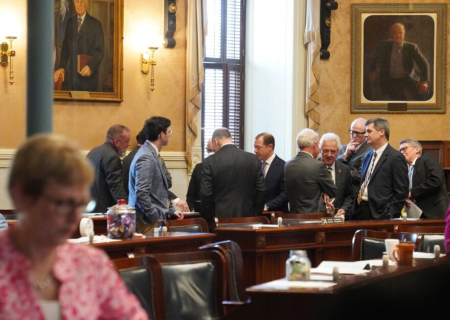 Several Senate Republicans huddle up briefly during discussion over the SCDOT modernization bill, S. 831, in the Senate chamber at the Statehouse on March 11, 2026.