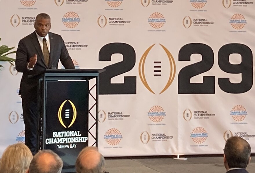 Man speaking at podium