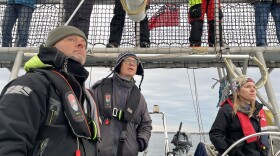 Researchers and spotters aboard "Song of the Whale" eagerly search for North Atlantic right whales in Cape Cod Bay.