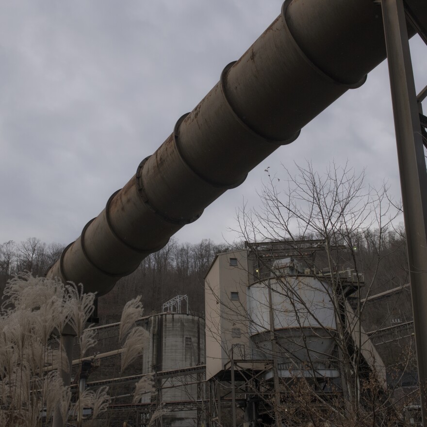 A coal processing plant sits abandoned near Smith's home in Pike County.