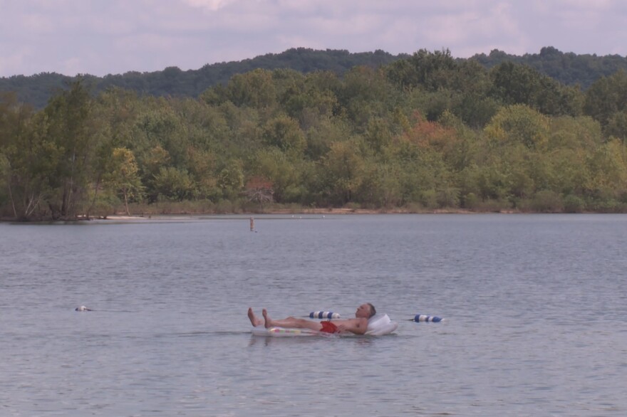 A man swims on Lake Monroe, August 2019.