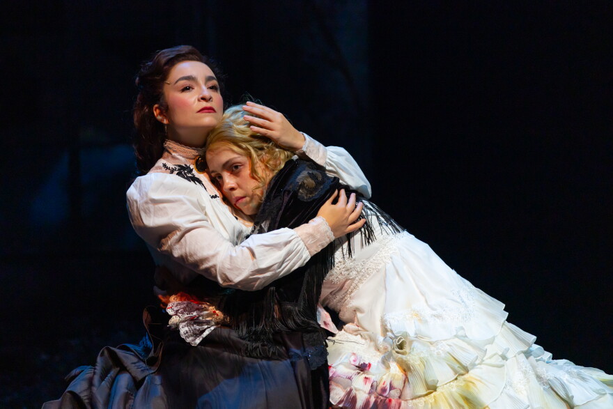 Sara Gutierrez as Mina (left) and Scout Backus as Lucy in Morgan Lloyd Malcolm’s adaptation of ‘Dracula,’ which is making its U.S. debut at Hartford Stage through November 1.