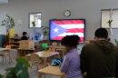 A Puerto Rican flag is displayed on a screen in a classroom at the John Cardinal O’Connor Center for Parent and Child Development, a Head Start center operated by The New York Foundling, in San Juan, Puerto Rico, Tuesday, Oct. 13, 2026.