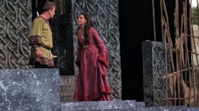 Macbeth and Lady Macbeth (Marc Singer and Laura Johnson) plot the deadly downfall of King Duncan.