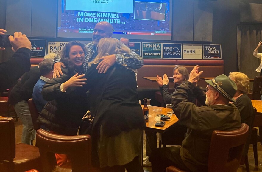  Plank hugs loved ones after a winning the Race for state representative of the 47th district. 