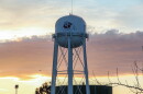 The Fresno State water tower shows the campus bulldog mascot.