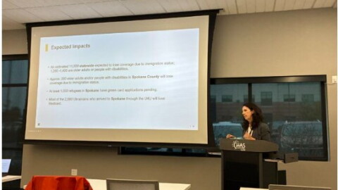 Margaret Hinson, director of the International Rescue Committee in Spokane, presents the statistics she could find on who may lose healthcare coverage after H.R. 1’s refugee federal Medicaid policy changes to take effect Oct. 1.