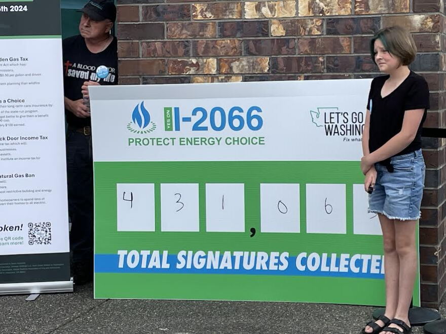 In 2024, Washington voters approved Initiative 2066 that aimed to halt the state's push to end natural gas use in homes and buildings. On Thursday, the state Supreme Court found the measure unconstitutional. Shea White of Du Pont, Washington, pictured above, wrote in the number of signatures initially submitted for the measure in July 2024.