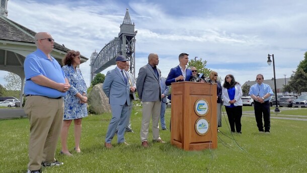 Cape Cod lawmakers called for commuter rail to the Cape — or at least to Buzzards Bay, to start — at a press conference Wednesday led by state Sen. Dylan Fernandes. Speakers included, from left, Bourne Select Board members Peter Meier and Anne-Marie Siroonian, state Reps. Steven Xiarhos and Kip Diggs, and Fernandes. May 27, 2026.
