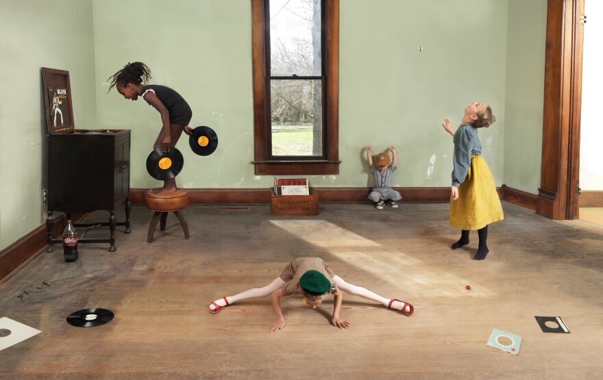 Julie Blackmon (American, born 1966), Records, 2021, archival pigment print, edition 1 of 7, 44 x 67 ½ inches. Collection of Andrea and Steve Morgan. Art and photo © Julie Blackmon.