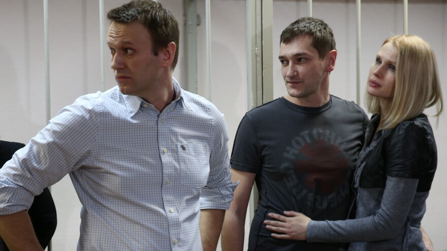 Russian opposition leader Alexey Navalny (left) and his brother Oleg Navalny appear in Moscow for sentencing last month after their conviction for fraud. Alexey was given a 3 1/2-year suspended sentence. His brother was sent to prison for the same period.