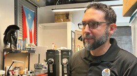 Miguel Diaz runs Rich Port Coffee in Norfolk. He relied on Latino markets, or tiendas, to bolster his business when he was starting out. (Photo by Ryan Murphy)