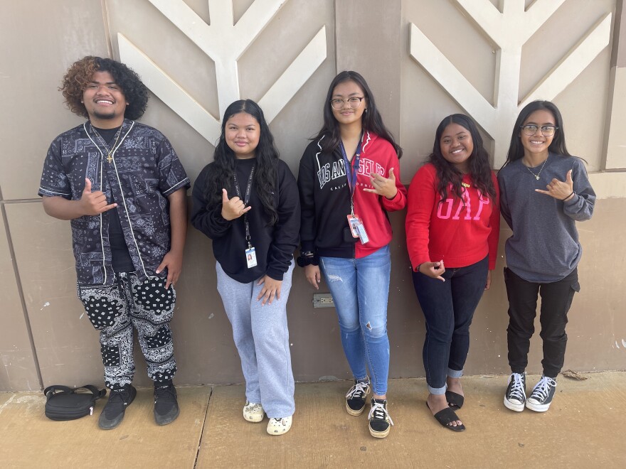 Waipahu High School students Tiner Masaichy, Stephanie Menor, Jheanna Mae Carlos, Sylvia Hopolong and Edlyn Francis contributed to her book, "Rising from Our Roots."